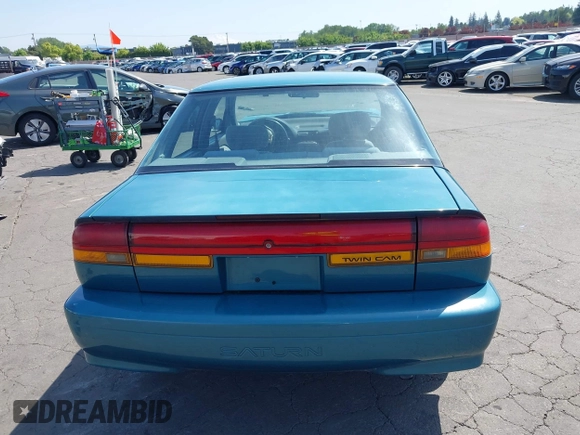 1995 Saturn SL with VIN 1G8ZK5277SZ320711, listed as a IAAI auction lot 42115543 with 77,558 mi miles and . Bid and sale history available at DreamBid. Image 16.