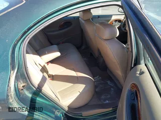 1999 Mercury Sable LS z VIN 1MEFM53S7XA612899, wystawiony jako IAAI lot #41687188 z przebiegiem 155 128 mil mil oraz . Historia ofert i sprzedaży dostępna na DreamBid. Obrazek 8.