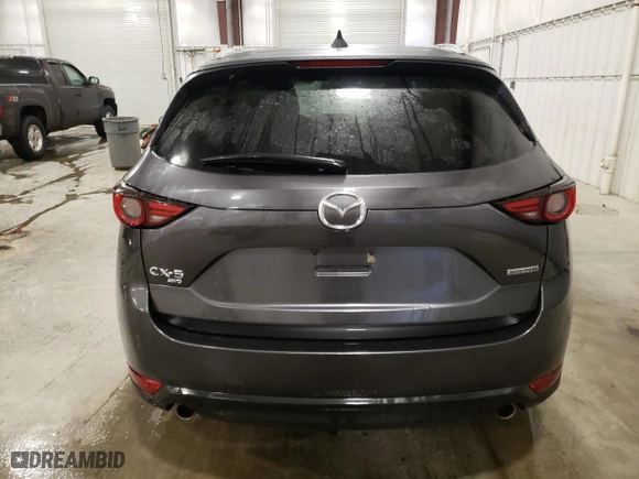 2021 Mazda CX-5 Grand Touring with VIN JM3KFBDM4M0465541, listed as a Copart auction lot 46104715 with 79,051 mi miles and Non Repairable. Bid and sale history available at carsss.com. Image 6.