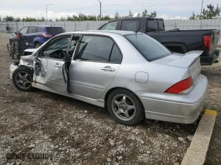 2003 Mitsubishi Lancer OZ-Rally with VIN JA3AJ86E93U602975, listed as a Copart auction lot 71230024 with 0 mi miles and Salvage Title. Bid and sale history available at carsss.com. Image 2.