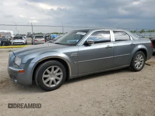 2007 Chrysler 300 C with VIN 2C3KA63H17H872014, listed as a Copart auction lot 58895934 with 99,202 mi miles and Salvage Title. Bid and sale history available at carsss.com. Image 1.