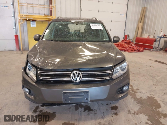 2012 Volkswagen Tiguan SE with VIN WVGBV7AX6CW093750, listed as a IAAI auction lot 42329775 with 117,509 mi miles and . Bid and sale history available at DreamBid. Image 12.