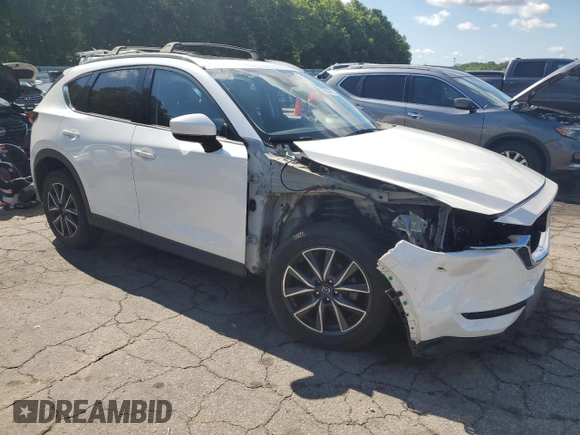 2018 Mazda CX-5 Grand Touring с VIN JM3KFADM3J1351532, выставлен на аукционе Copart как лот 55567405 с пробегом 99 134 миль миль и Списание • Salvage title. История ставок и продаж доступна на DreamBid. Изображение 4.