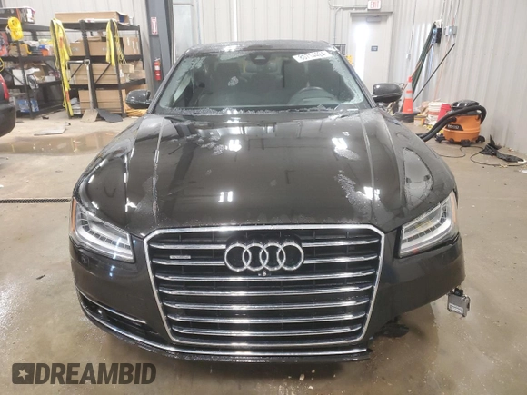 2015 Audi A8 4.0T z VIN WAUJ2AFD5FN009882, wystawiony jako Copart lot #84222704 z przebiegiem 56 118 mil mil oraz Czysty tytuł • Clean title. Historia ofert i sprzedaży dostępna na DreamBid. Obrazek 5.
