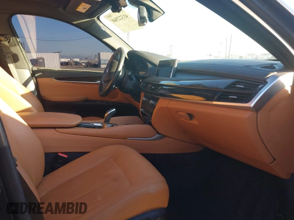 2019 BMW X6 sDrive35i z VIN 5UXKU0C57K0S97581, wystawiony jako IAAI lot #41322568 z przebiegiem 76 635 mil mil oraz . Historia ofert i sprzedaży dostępna na DreamBid. Obrazek 5.