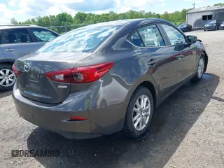 2016 Mazda 3 i Sport with VIN JM1BM1U76G1326853, listed as a IAAI auction lot 42194395 with 73,719 mi miles and . Bid and sale history available at DreamBid. Image 4.