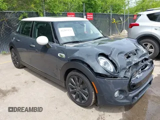 2019 MINI Hardtop 4 Door Cooper S z VIN WMWXU3C54K2H86856, wystawiony jako IAAI lot #42201474 z przebiegiem 56 610 mil mil oraz . Historia ofert i sprzedaży dostępna na DreamBid. Obrazek 1.