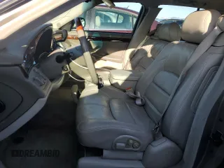 2002 Cadillac DeVille DHS z VIN 1G6KE57Y32U107755, wystawiony jako Copart lot #52811235 z przebiegiem 111 141 mil mil oraz Nie do naprawy. Historia ofert i sprzedaży dostępna na DreamBid. Obrazek 7.