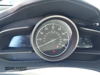 2018 Mazda 3 Touring z VIN 3MZBN1L36JM238646, wystawiony jako IAAI lot #41376772 z przebiegiem 97 261 mil mil oraz . Historia ofert i sprzedaży dostępna na DreamBid. Obrazek 7.