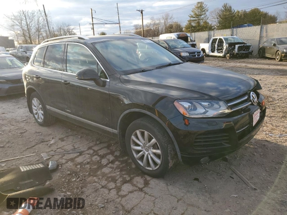 2012 Volkswagen Touareg Sport z VIN WVGEF9BP7CD006020, wystawiony jako Copart lot #88211145 z przebiegiem 180 729 mil mil oraz Szkoda całkowita • Salvage title. Historia ofert i sprzedaży dostępna na DreamBid. Obrazek 4.