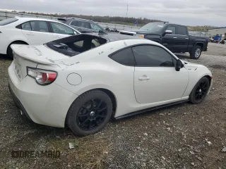 2015 Scion FR-S z VIN JF1ZNAA14F8703283, wystawiony jako Copart lot #50995885 z przebiegiem 101 033 mil mil oraz Szkoda całkowita • Salvage title. Historia ofert i sprzedaży dostępna na DreamBid. Obrazek 3.