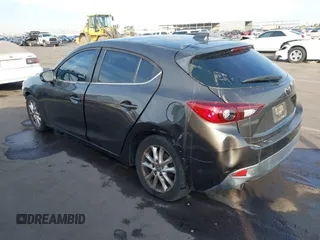 2015 Mazda 3 i Touring with VIN 3MZBM1L74FM236410, listed as a IAAI auction lot 41339253 with 119,731 mi miles and . Bid and sale history available at DreamBid. Image 3.
