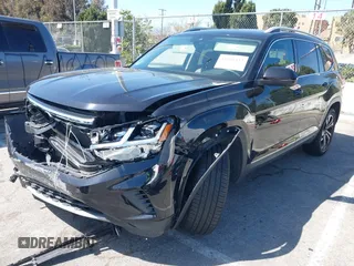 2021 Volkswagen Atlas SEL Premium z VIN 1V2TR2CA8MC512367, wystawiony jako IAAI lot #41936437 z przebiegiem 62 416 mil mil oraz . Historia ofert i sprzedaży dostępna na DreamBid. Obrazek 2.