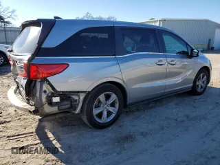 2020 Honda Odyssey EX-L with VIN 5FNRL6H73LB056720, listed as a Copart auction lot 87205024 with 60,219 mi miles and Salvage Title. Bid and sale history available at carsss.com. Image 3.