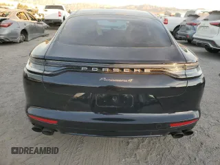 2023 Porsche Panamera с VIN WP0AJ2A73PL100692, выставлен на аукционе Copart как лот 84332864 с пробегом 10 131 миль миль и Списание • Salvage title. История ставок и продаж доступна на DreamBid. Изображение 6.