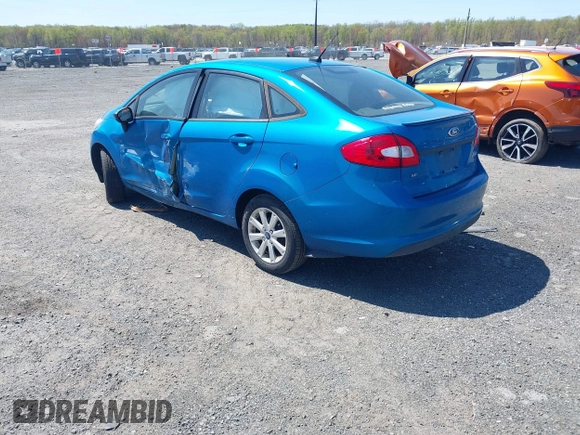 2012 Ford Fiesta SE with VIN 3FADP4BJXCM125881, listed as a IAAI auction lot 42044455 with 156,804 mi miles. Bid and sale history available at carsss.com. Image 3.