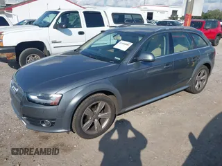 2014 Audi allroad Premium Plus with VIN WA1UFAFL7EA006011, listed as a IAAI auction lot 41494881 with 70,461 mi miles. Bid and sale history available at carsss.com. Image 2.