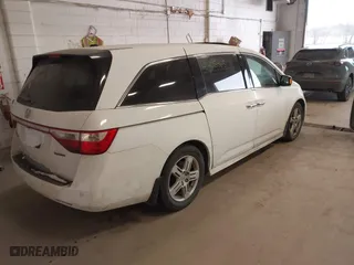 2011 Honda Odyssey Touring with VIN 5FNRL5H9XBB057468, listed as a IAAI auction lot 41405465 with 1 mi miles. Bid and sale history available at carsss.com. Image 4.