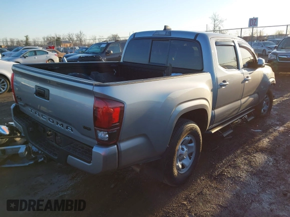 2021 Toyota Tacoma SR z VIN 3TMCZ5AN5MM386394, wystawiony jako IAAI lot #41821364 z przebiegiem 54 070 mil mil oraz . Historia ofert i sprzedaży dostępna na DreamBid. Obrazek 4.
