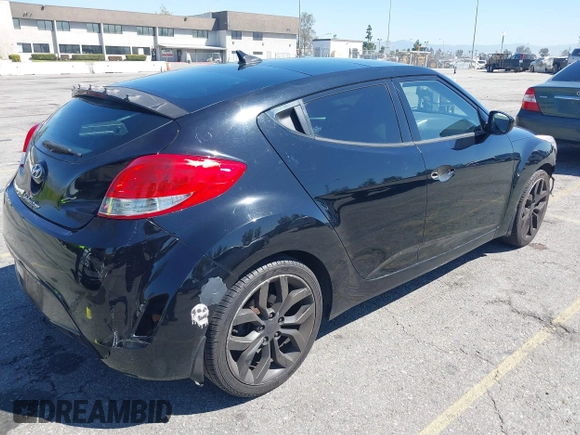 2013 Hyundai Veloster w/Black Int z VIN KMHTC6AD7DU173310, wystawiony jako IAAI lot #41881799 z przebiegiem 147 034 mil mil oraz . Historia ofert i sprzedaży dostępna na DreamBid. Obrazek 4.
