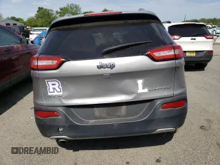 2016 Jeep Cherokee Limited z VIN 1C4PJMDB0GW112352, wystawiony jako Copart lot #52703043 z przebiegiem 60 642 mil mil oraz Szkoda całkowita • Salvage title. Historia ofert i sprzedaży dostępna na DreamBid. Obrazek 6.