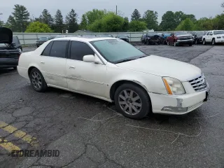 2008 Cadillac DTS 1SA z VIN 1G6KD57Y48U178829, wystawiony jako Copart lot #56669235 z przebiegiem 118 380 mil mil oraz Szkoda całkowita • Salvage title. Historia ofert i sprzedaży dostępna na DreamBid. Obrazek 4.