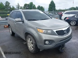 2013 Kia Sorento LX with VIN 5XYKT3A6XDG409434, listed as a IAAI auction lot 42628868 with 161,972 mi miles and . Bid and sale history available at DreamBid. Image 1.