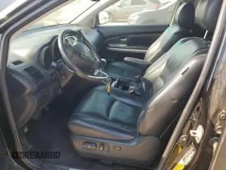 2006 Lexus RX 400h with VIN JTJHW31UX60001795, listed as a Copart auction lot 64407255 with 163,818 mi miles and Salvage title. Bid and sale history available at DreamBid. Image 7.