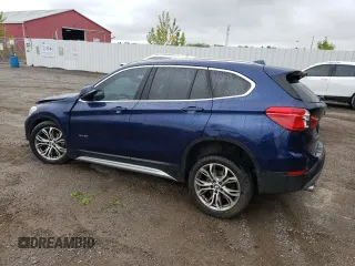 2018 BMW X1 xDrive28i with VIN WBXHT3C35J5F88893, listed as a Copart auction lot 58032725 with 143,968 mi miles and Salvage title. Bid and sale history available at DreamBid. Image 2.