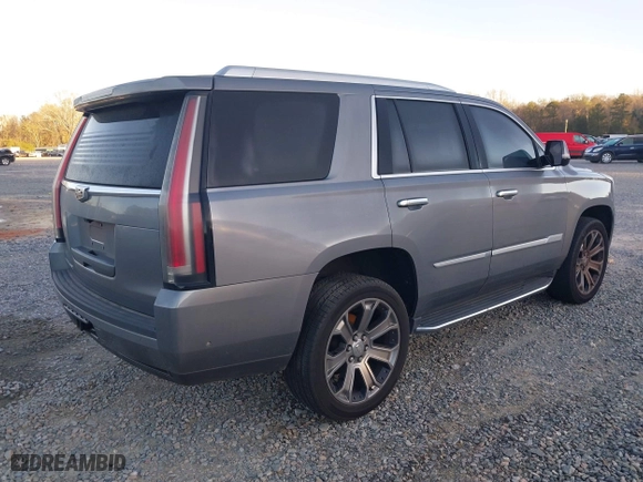 2018 Cadillac Escalade Luxury with VIN 1GYS3BKJ1JR307525, listed as a IAAI auction lot 41800377 with 171,484 mi miles. Bid and sale history available at carsss.com. Image 4.