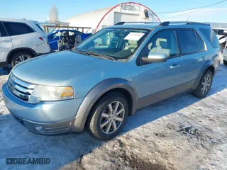 2008 Ford Taurus X SEL with VIN 1FMDK05W78GA20642, listed as a IAAI auction lot 41330080 with 128,928 mi miles. Bid and sale history available at carsss.com. Image 2.