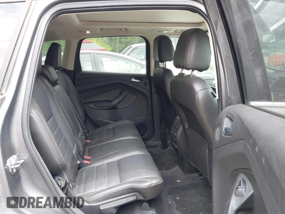 2013 Ford Escape SEL z VIN 1FMCU0H96DUC33699, wystawiony jako IAAI lot #42779073 z przebiegiem 120 992 mil mil oraz . Historia ofert i sprzedaży dostępna na DreamBid. Obrazek 8.