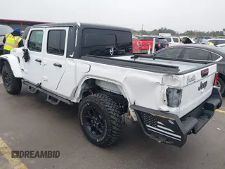 2021 Jeep Gladiator Willys with VIN 1C6HJTAG1ML575474, listed as a IAAI auction lot 41439898 with 44,335 mi miles and . Bid and sale history available at DreamBid. Image 3.