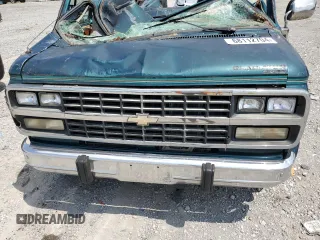 1995 Chevrolet Chevy Van z VIN 1GBEG25K7SF103122, wystawiony jako Copart lot #68112704 z przebiegiem Nie podano mil oraz Szkody całkowita. Historia ofert i sprzedaży dostępna na DreamBid. Obrazek 12.