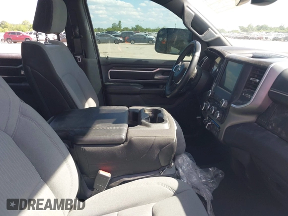2023 Ram 1500 Big Horn with VIN 1C6RRFFG2PN649047, listed as a IAAI auction lot 42259338 with 14,986 mi miles and . Bid and sale history available at DreamBid. Image 5.