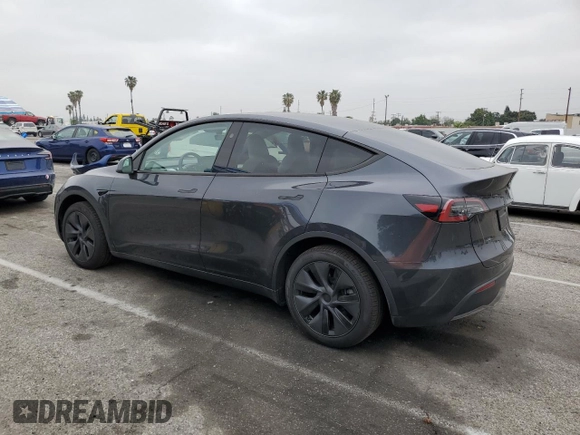 2025 Tesla Model Y Long Range with VIN 7SAYGDED8SF277469, listed as a Copart auction lot 45600195 with 442 mi miles and Salvage Title. Bid and sale history available at DreamBid. Image 2.