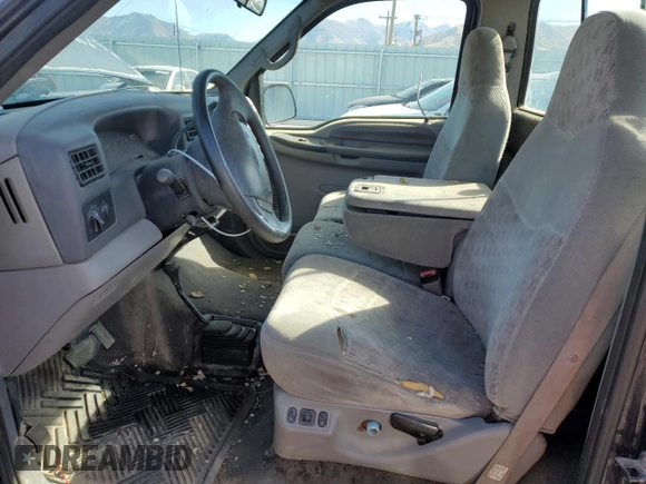 1999 Ford F-250 with VIN 1FTNF21S1XED16309, listed as a Copart auction lot 77267764 with 216,158 mi miles and Clean title. Bid and sale history available at DreamBid. Image 7.