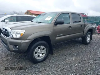 2015 Toyota Tacoma with VIN 3TMLU4EN1FM201554, listed as a IAAI auction lot 42008012 with 118,313 mi miles and . Bid and sale history available at DreamBid. Image 2.