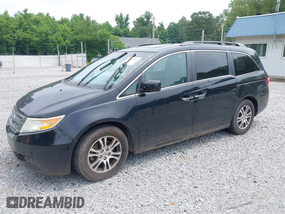 2012 Honda Odyssey EX-L with VIN 5FNRL5H66CB095996, listed as a IAAI auction lot 42446499 with 198,016 mi miles and . Bid and sale history available at DreamBid. Image 2.