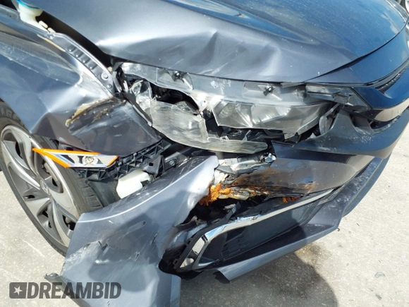 2020 Honda Civic LX with VIN 2HGFC2F65LH575320, listed as a IAAI auction lot 42009564 with Not Provided miles and . Bid and sale history available at DreamBid. Image 6.