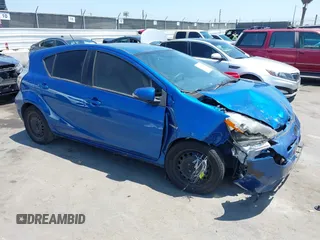 2013 Toyota Prius One z VIN JTDKDTB39D1037425, wystawiony jako IAAI lot #42482346 z przebiegiem 153 595 mil mil oraz . Historia ofert i sprzedaży dostępna na DreamBid. Obrazek 1.