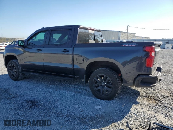 2022 Chevrolet Silverado 1500 LT Trail Boss with VIN 3GCUDFED2NG561825, listed as a Copart auction lot 77632284 with 34,448 mi miles and Salvage Title. Bid and sale history available at DreamBid. Image 2.