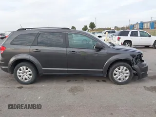 2018 Dodge Journey SE with VIN 3C4PDCABXJT170150, listed as a IAAI auction lot 40715756 with 113,330 mi miles and . Bid and sale history available at DreamBid. Image 13.