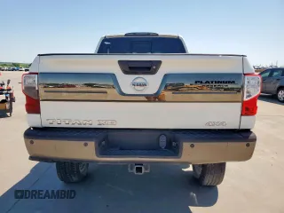 2017 Nissan Titan Pro-4X z VIN 1N6BA1F42HN575024, wystawiony jako Copart lot #52025835 z przebiegiem 23 422 mil mil oraz Czysty tytuł • Clean title. Historia ofert i sprzedaży dostępna na DreamBid. Obrazek 6.