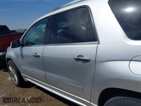 2014 GMC Acadia Denali z VIN 1GKKRTKD0EJ192610, wystawiony jako IAAI lot #41819095 z przebiegiem 121 075 mil mil oraz . Historia ofert i sprzedaży dostępna na DreamBid. Obrazek 14.