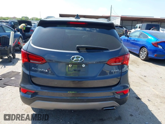 2017 Hyundai Santa Fe 2.4L z VIN 5XYZU3LB4HG462058, wystawiony jako IAAI lot #41861190 z przebiegiem 87 102 mil mil oraz . Historia ofert i sprzedaży dostępna na DreamBid. Obrazek 16.