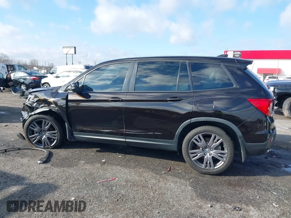 2021 Honda Passport EX-L with VIN 5FNYF7H56MB009450, listed as a IAAI auction lot 41474645 with 91,140 mi miles. Bid and sale history available at carsss.com. Image 14.