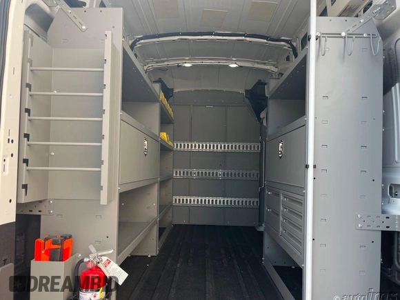 2023 Ford Transit Cargo with VIN 1FTBR1X80PKC09351, listed as a IAAI auction lot 42658958 with 115 mi miles and . Bid and sale history available at DreamBid. Image 7.