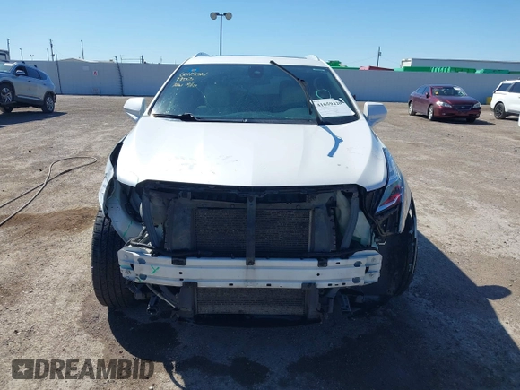 2017 Cadillac XT5 Premium Luxury FWD z VIN 1GYKNCRS9HZ106397, wystawiony jako IAAI lot #41659420 z przebiegiem 54 615 mil mil oraz . Historia ofert i sprzedaży dostępna na DreamBid. Obrazek 13.