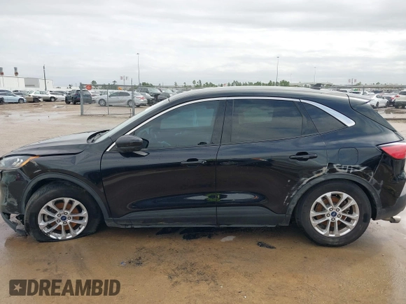 2020 Ford Escape SE with VIN 1FMCU0G61LUB77189, listed as a IAAI auction lot 41688121 with 101,407 mi miles and . Bid and sale history available at DreamBid. Image 15.